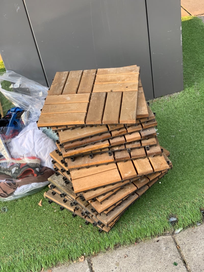Wooden tiles for the floor on a small balkony
