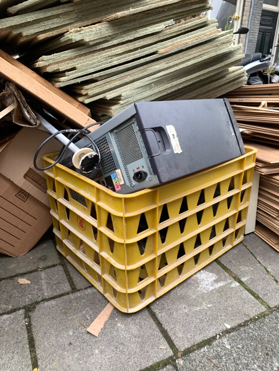 Nice big yellow box. Really big one.

Also some old pc and a monitor inside but I think they are broken