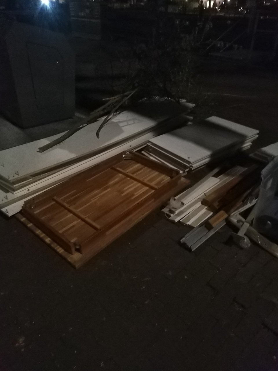 wooden table with legs disassembled. 3?-doors wardrobe. all pieces seem present.