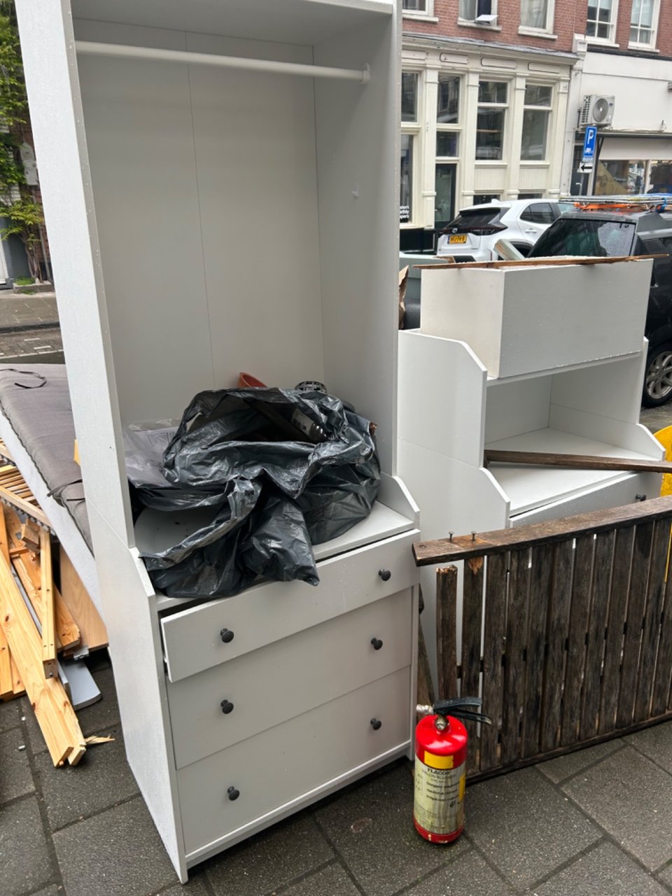 In back there’s a dismantled couch and more random stuff