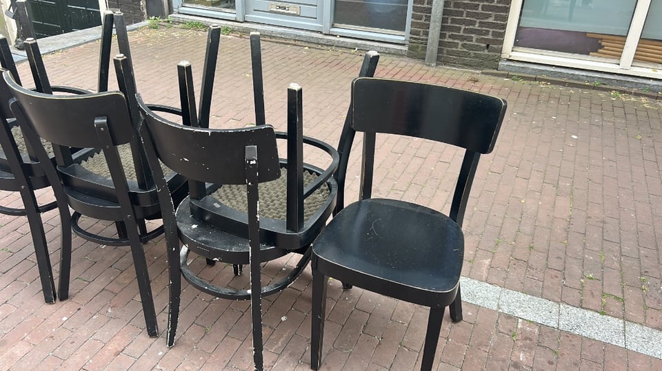 7 black chairs in good condition