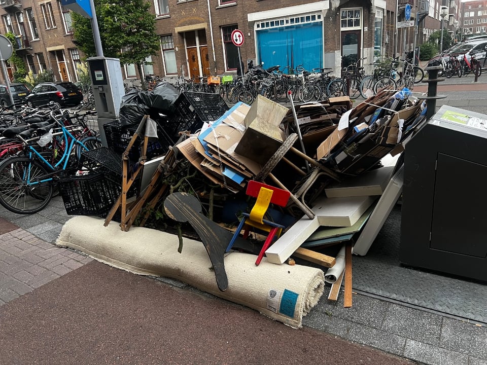 Mostly trash and crates, but inbetween some vintage furniture in decent shape