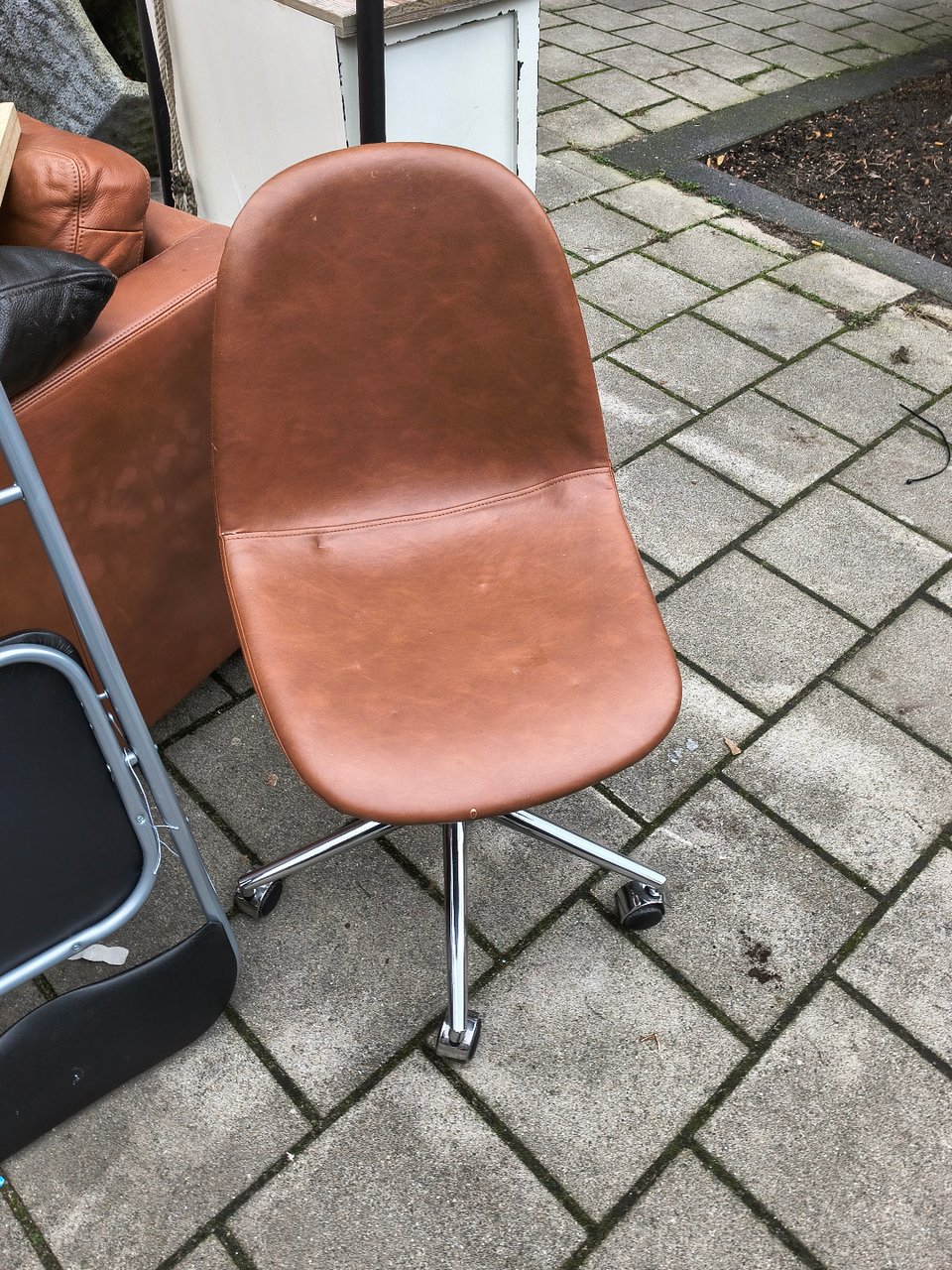 End of month giveaway: Leather armchair, chairs, table, night stand.