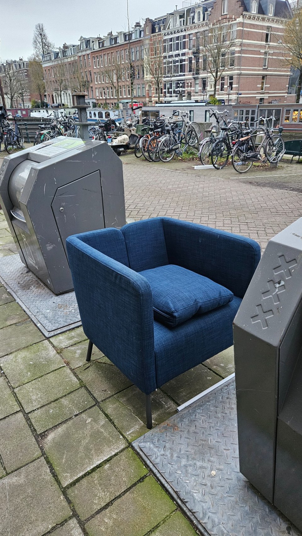 Armchair in blue jean like fabric. Looked in perfect condition.