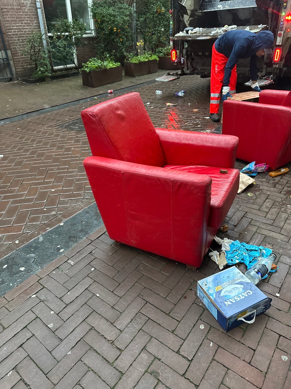 2 red leather chairs