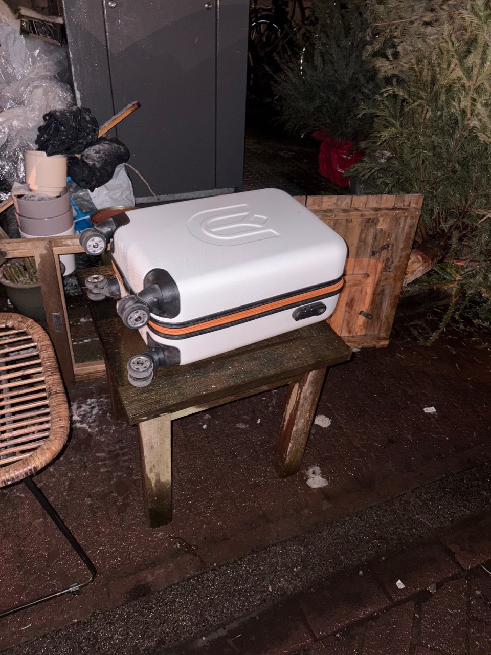 Suitcase and wooden table