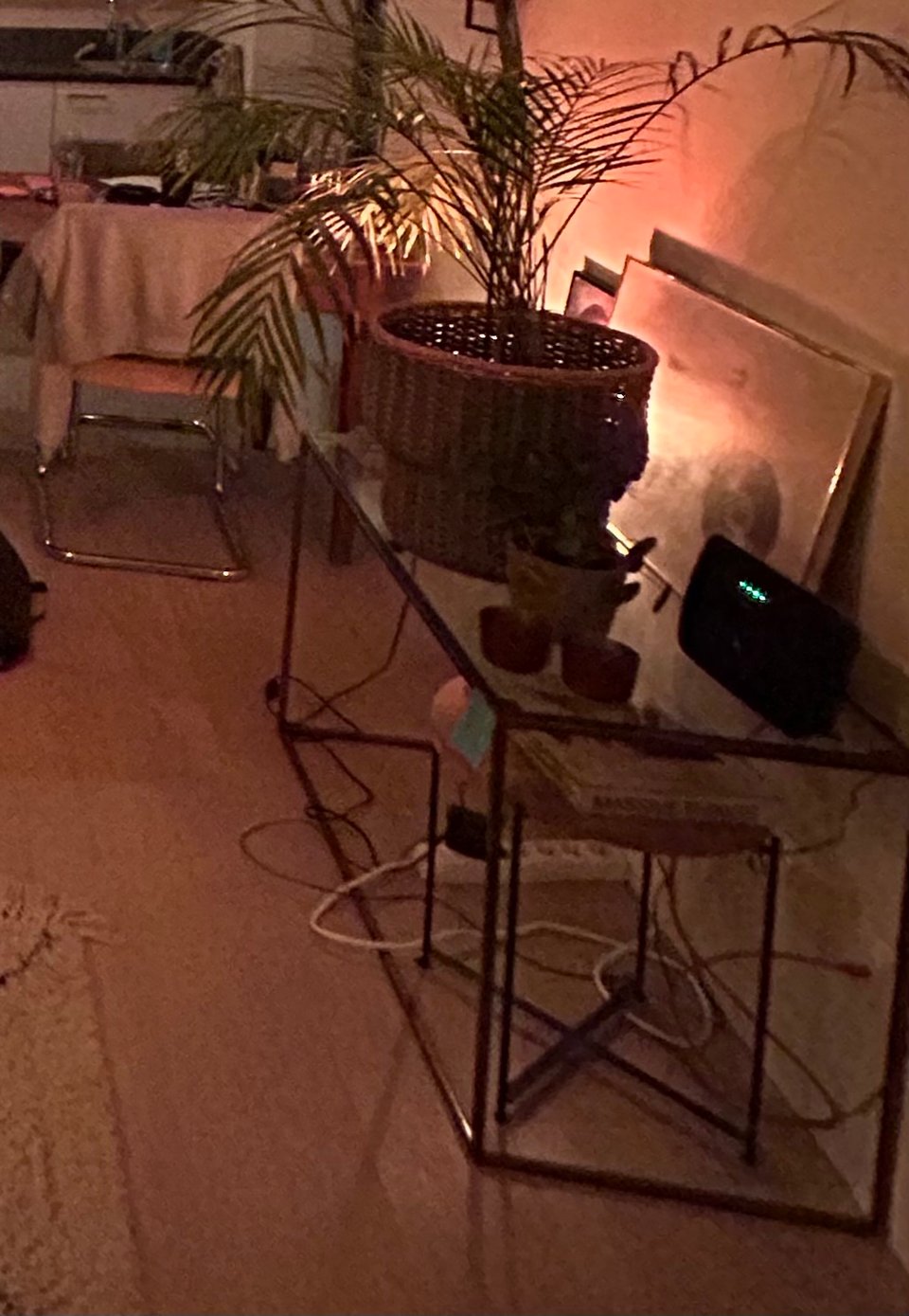 Glass coffee table with golden frame. It’s in the front garden to pick up.