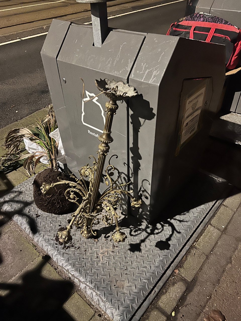 Heavy antique chandelier with beautiful flower decorations.