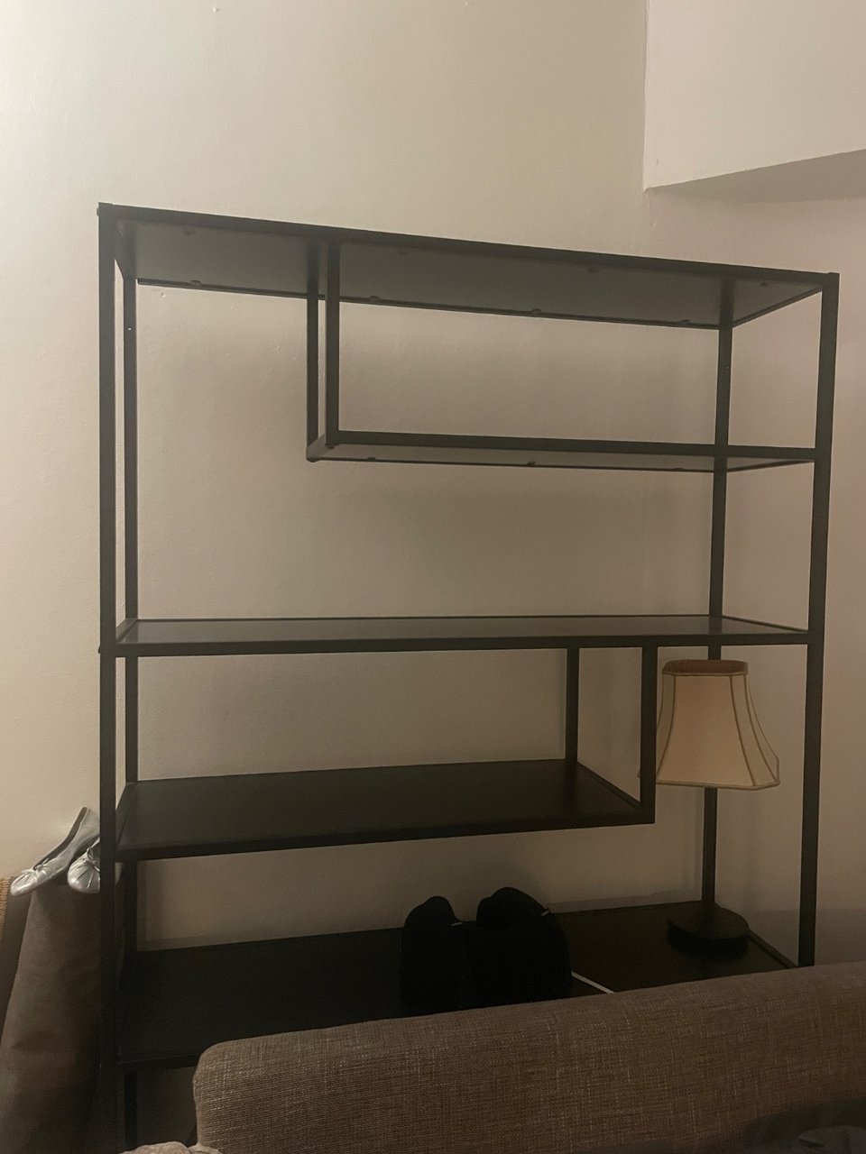 Black metal shelving unit available for free! First photo is what it looks like assembled. All parts are there.
