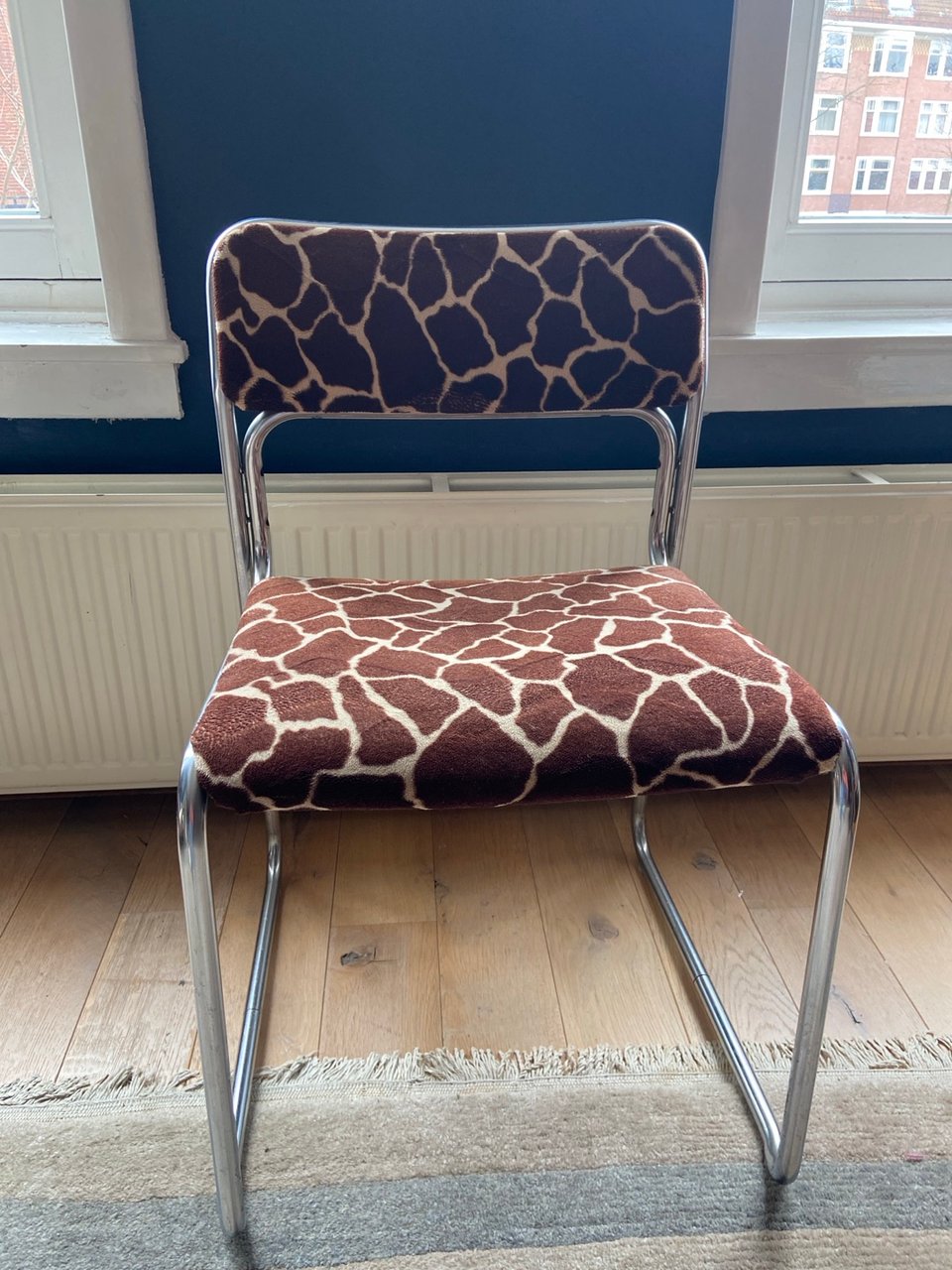 From this group, back in to the world again. 
Chrome Designer chair