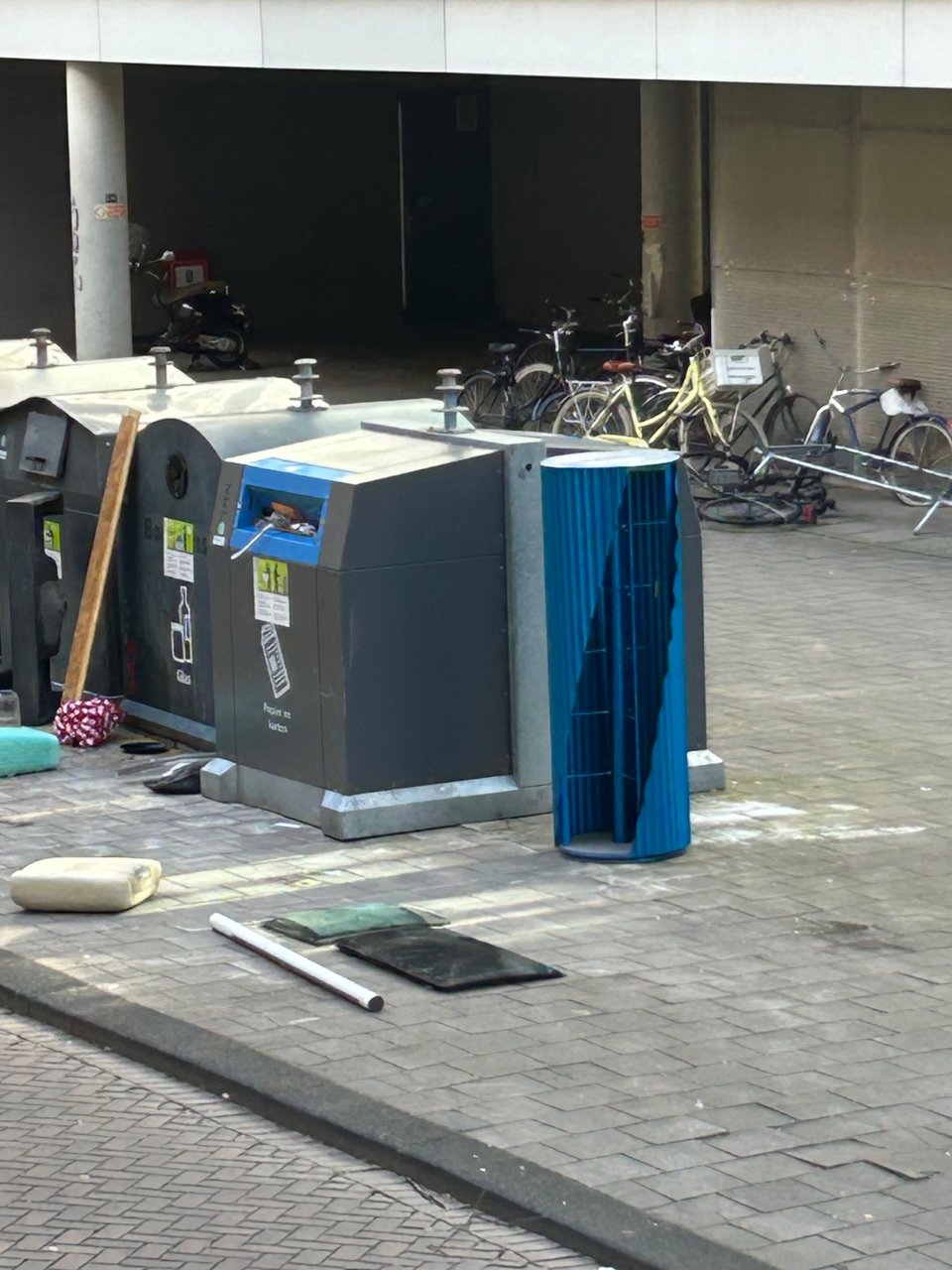 Revolving blue hanging closet (inner part and outer shell revolve independently from one another)