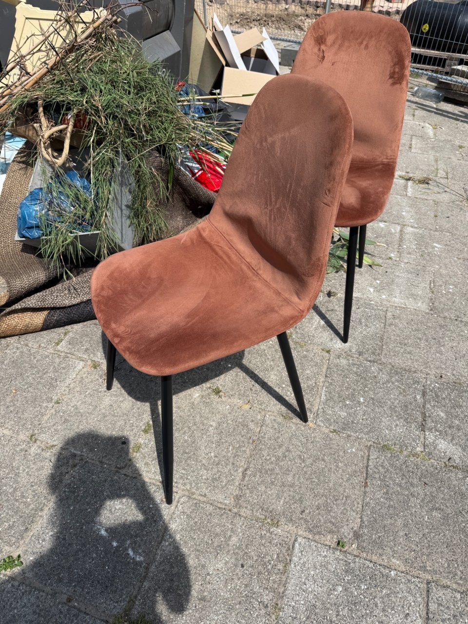 Three rust colored chairs in good condition !