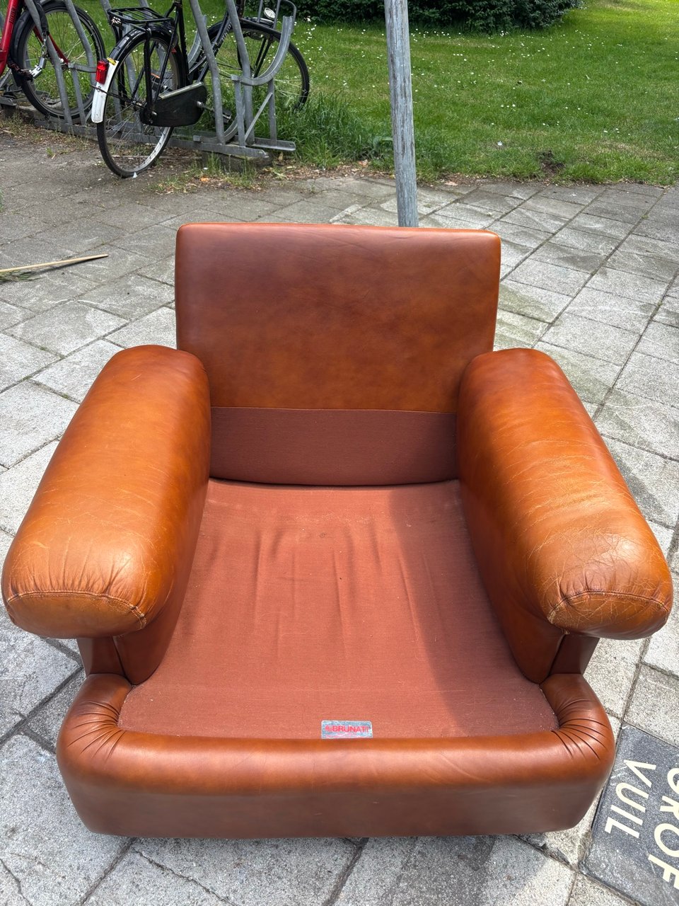 Italian designer leather chair made by Brunati without pillows. Leather not torn. High quality chair!