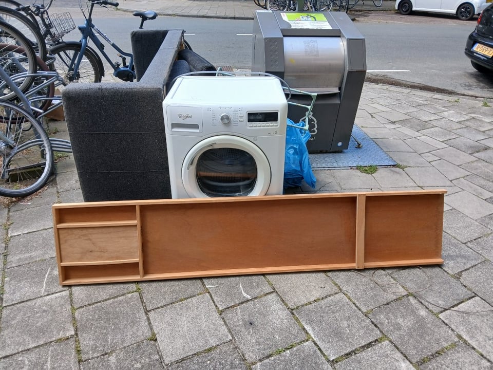 Wasmachine en sjoelbak zonder stenen