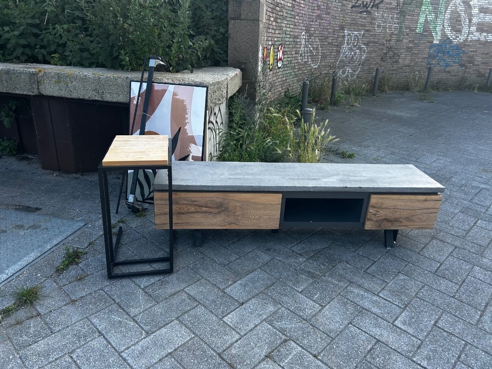 Tv cabinet, small table and large black poster frame