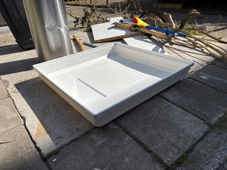 Wasmachine lekbak 70x70x10cm