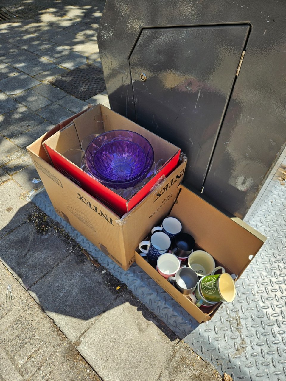 Large selection of glasses (wine, cocktail, etc), coffee mugs and bowls.
