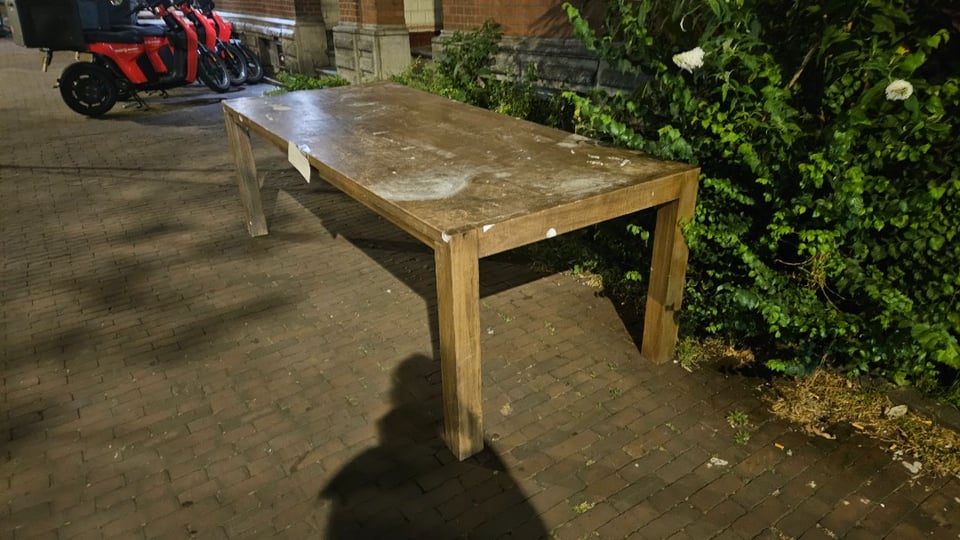 Big wooden table, with stains