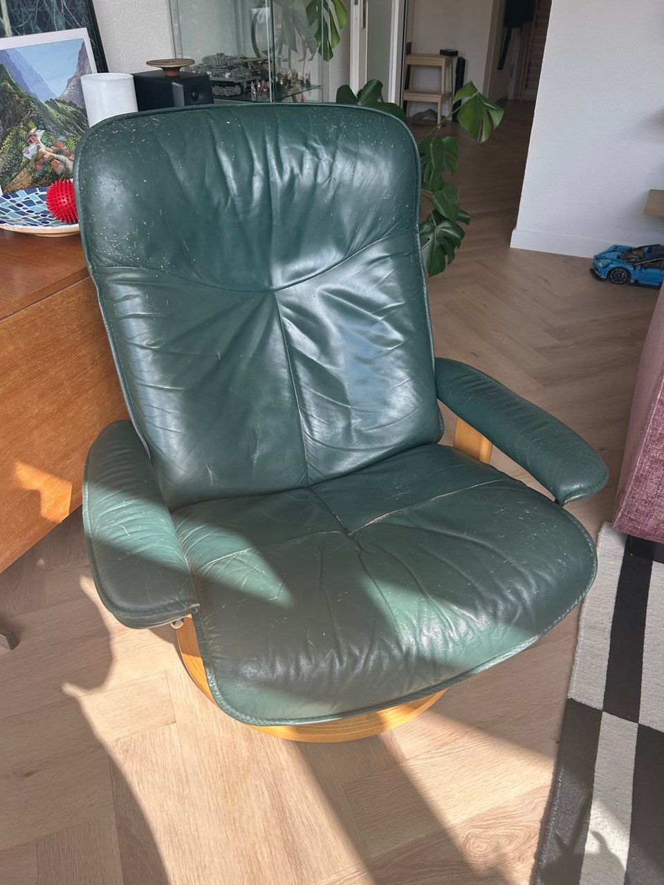 Stressless Chair (has some scratches from my cat) but can still be used.