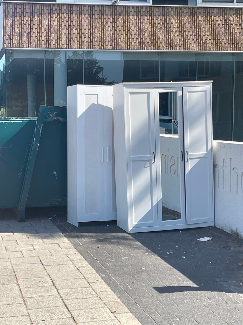 Two closets in great condition, also a lot more stuff in the containers on the street as well