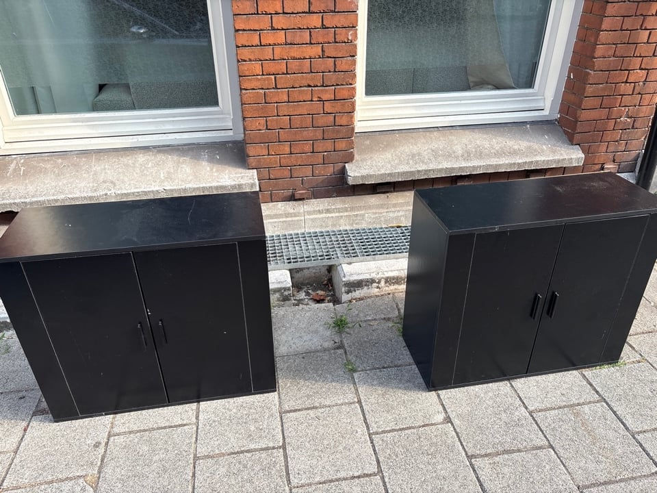 2 black cabinets