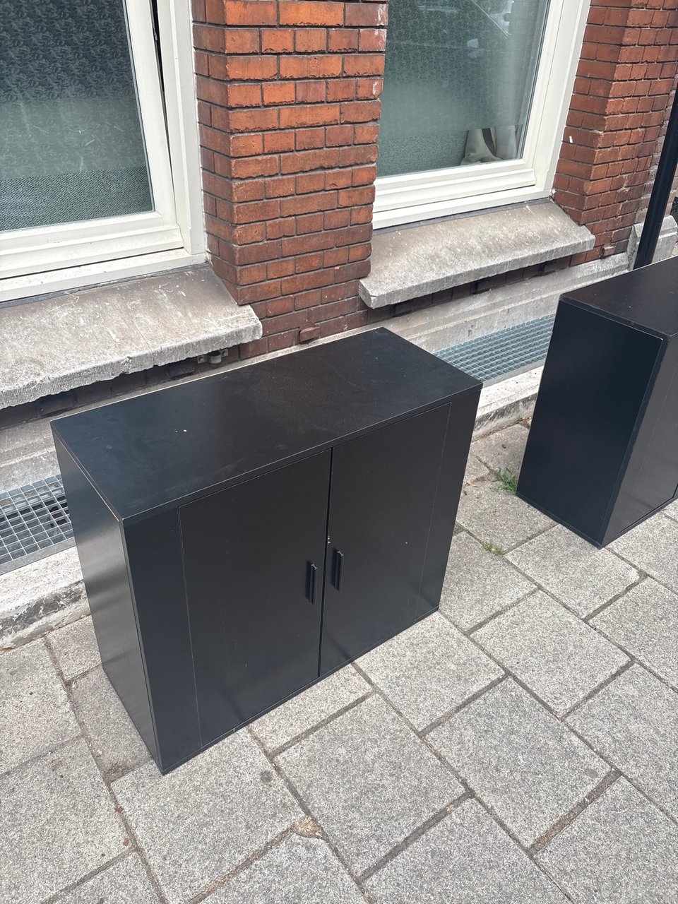 2 black cabinets