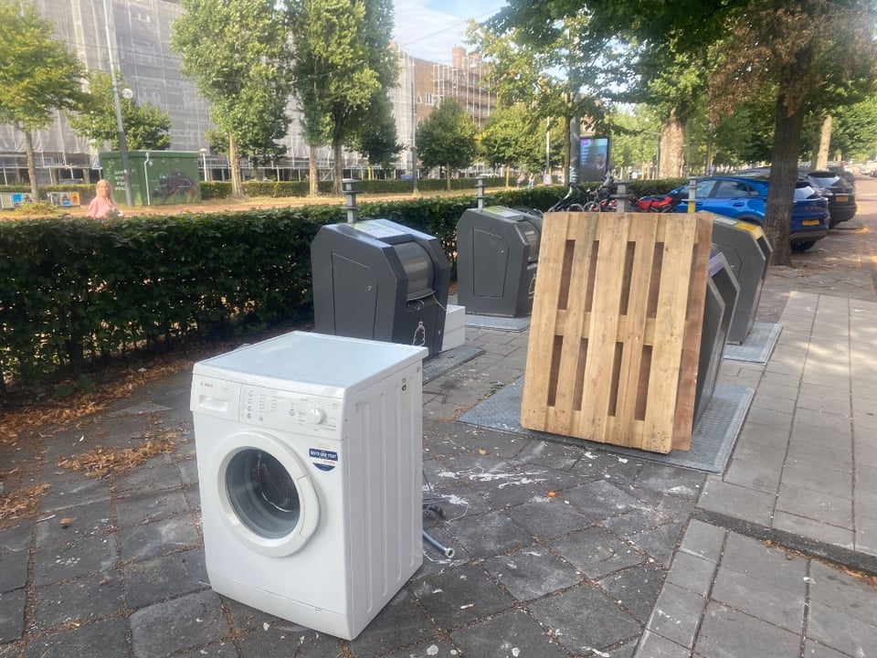 fully functional washing machine and wooden pallet