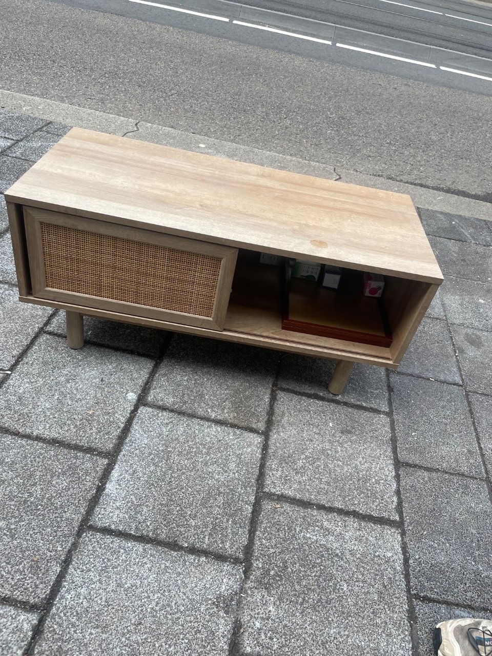 Tv cabinet, some gardening sheers and picture frames