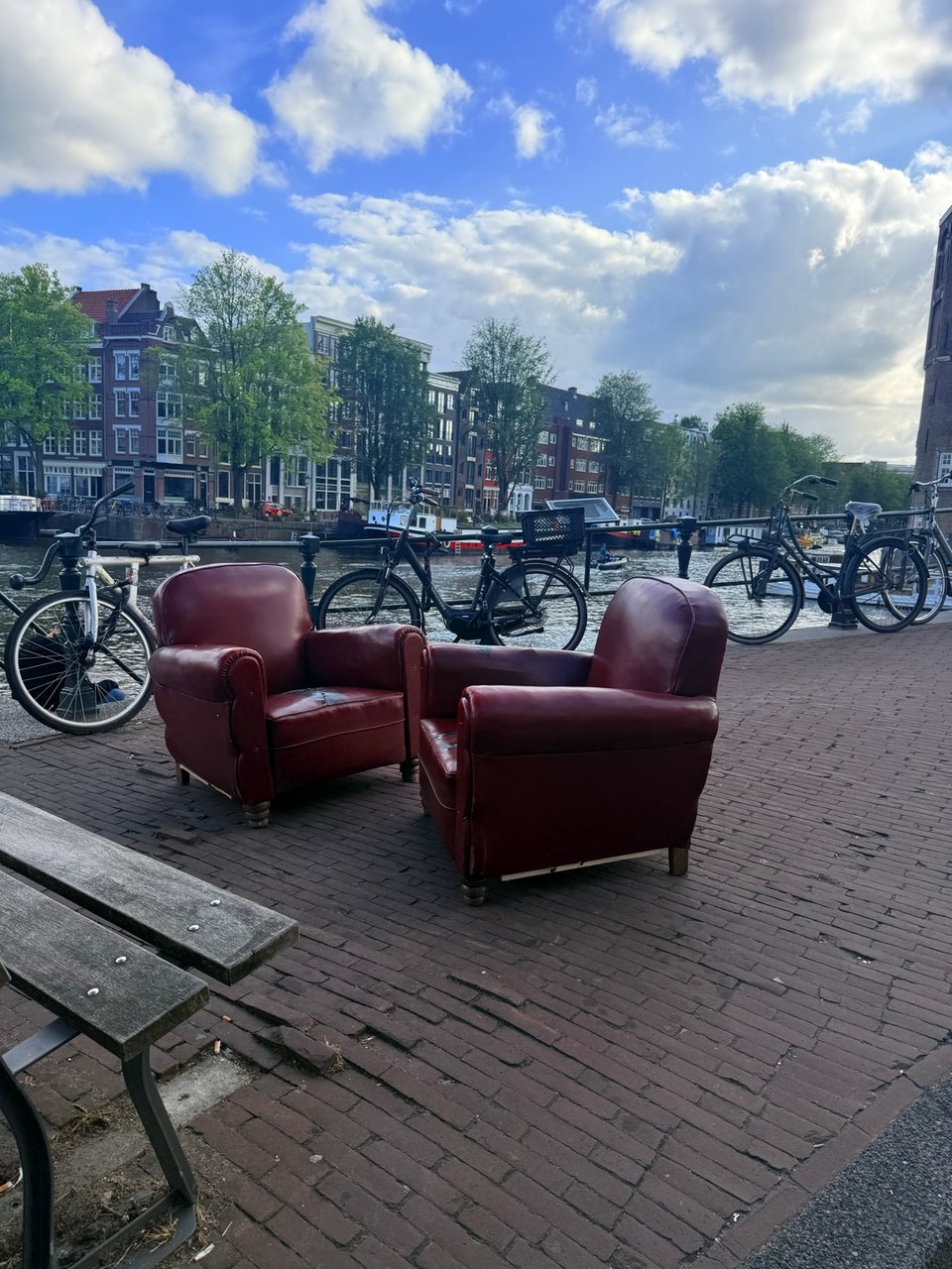 Two big red vintage armchairs
