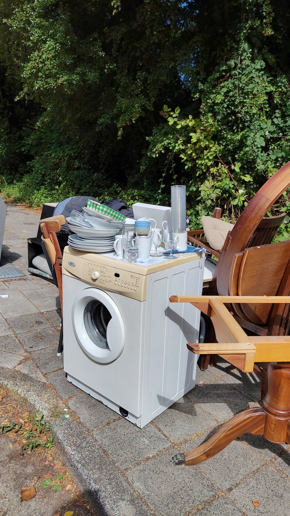 Washing machine, tables, plates and glasses, jackets