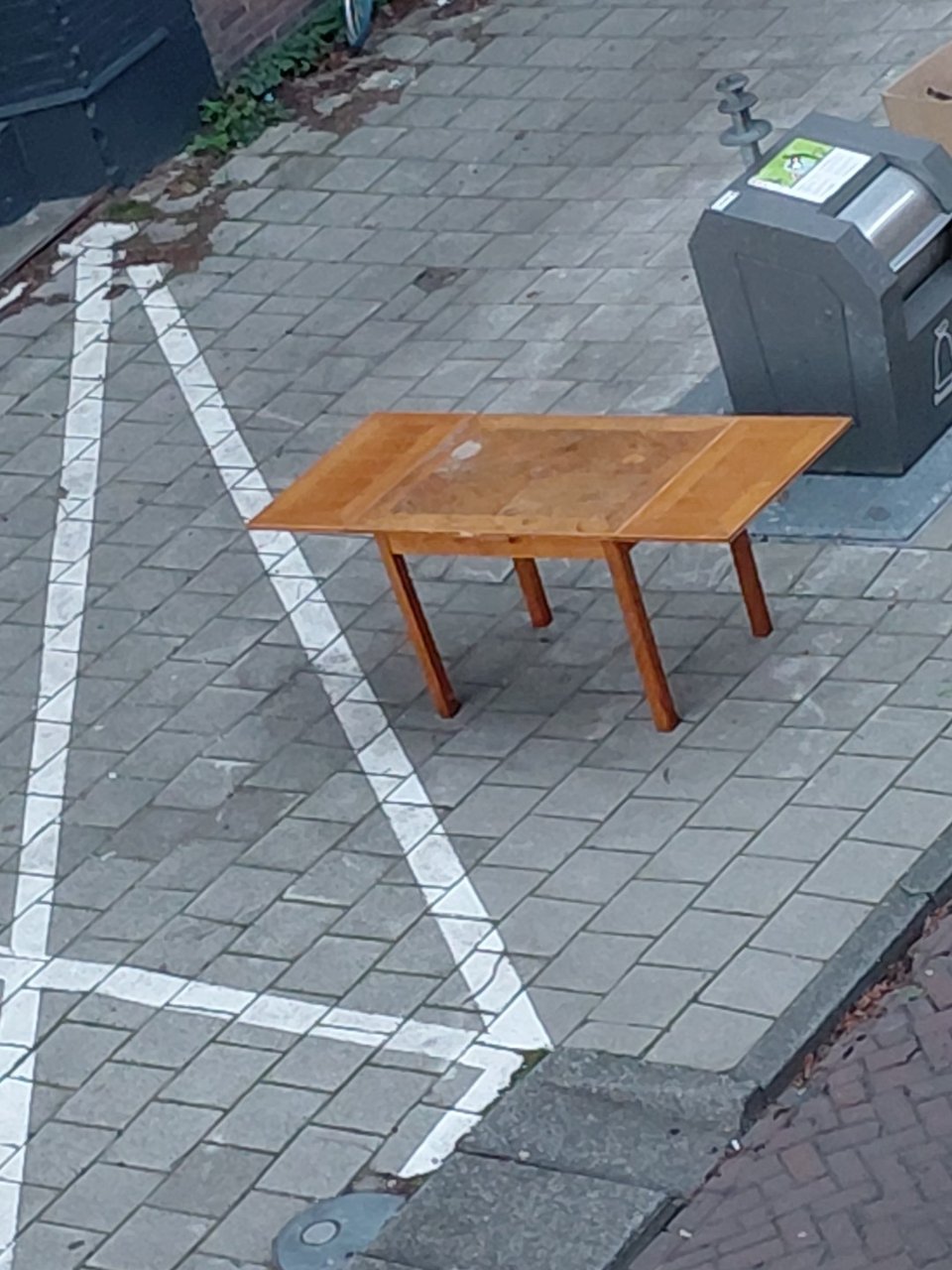 Photo of where it is from last post. Less damaged than it looks ( both side pieces can be slid in the table to make it smaller)!