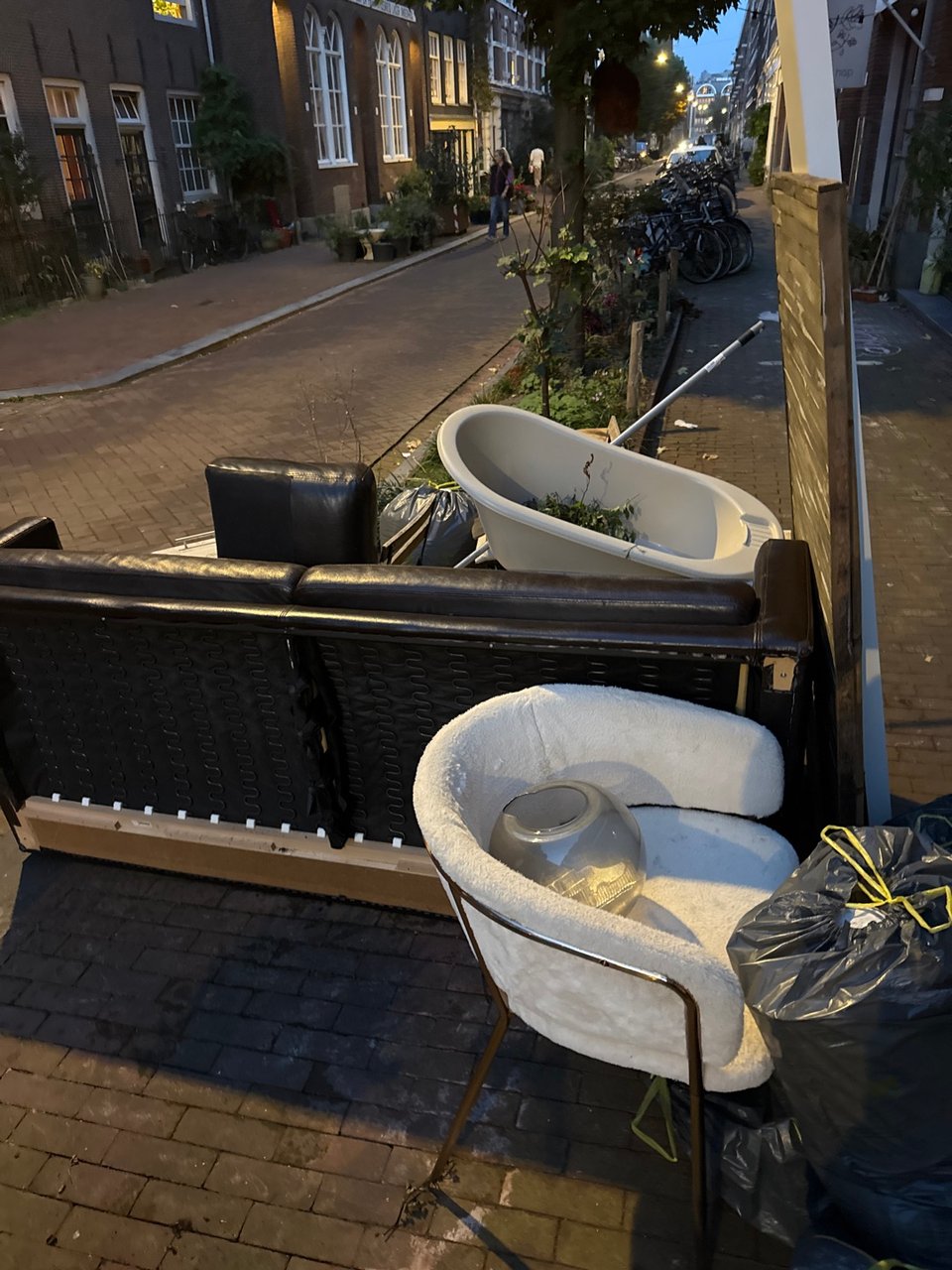 Couch, chairs, pans and some other stuff