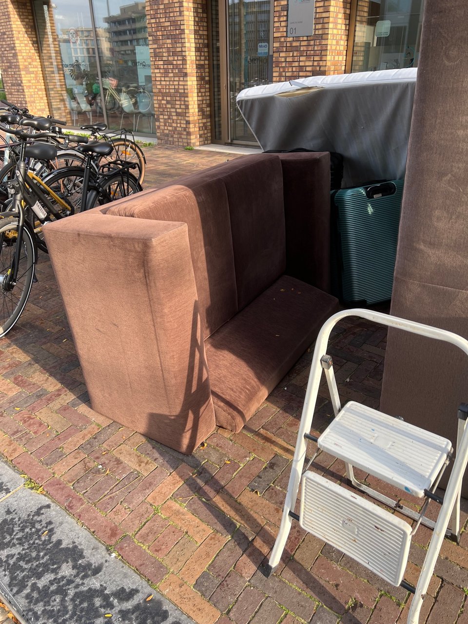 Two couches and a stepladder