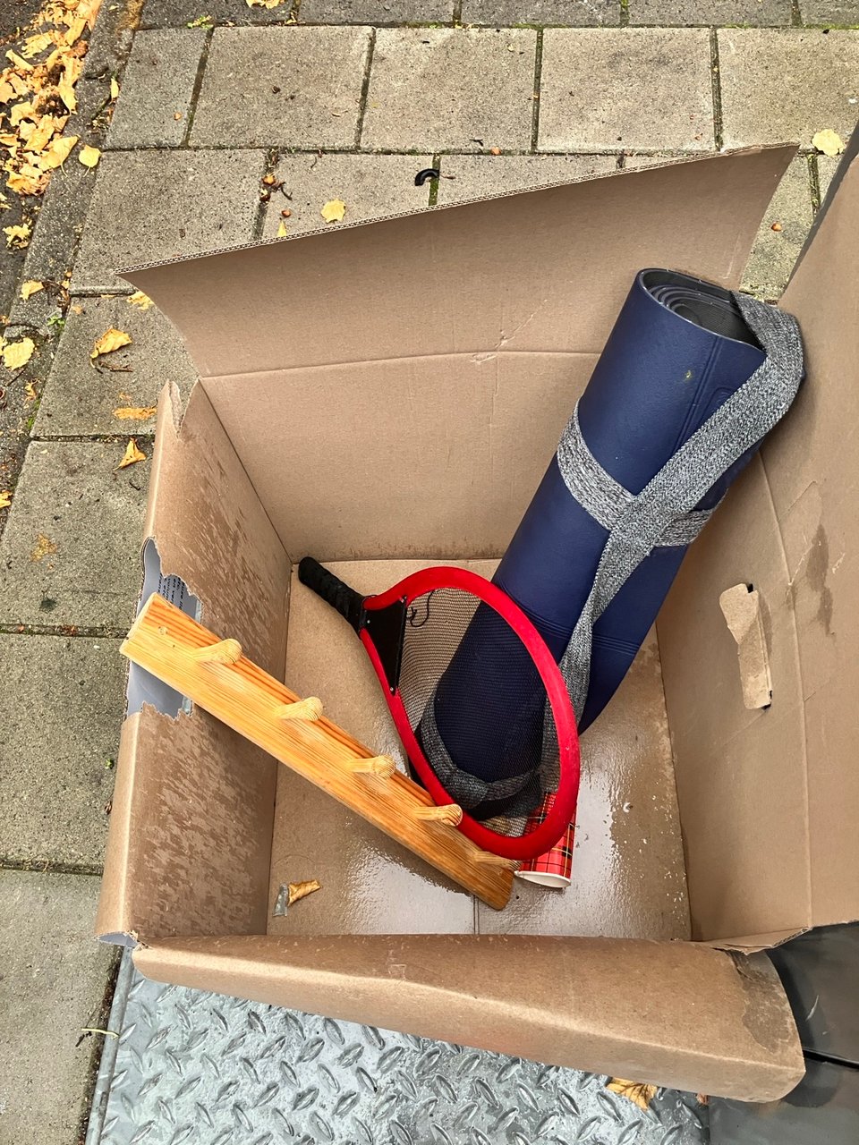 Yoga mat and coat hanger