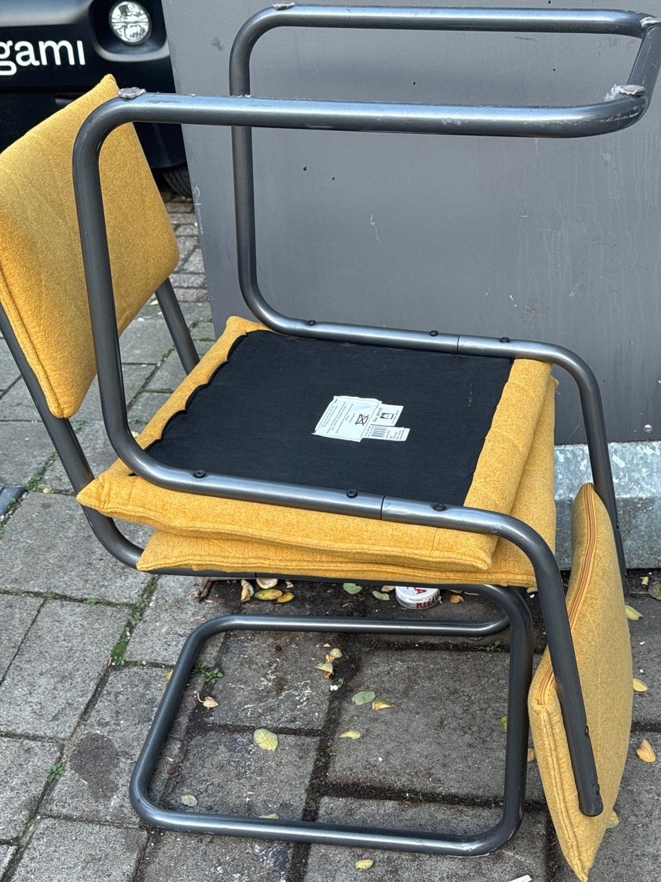 Two mustard yellow chairs, seemingly in good condition!